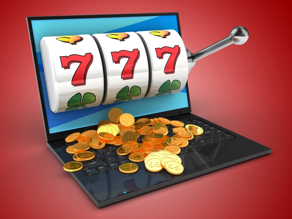 slot reels and laptop for online gambling